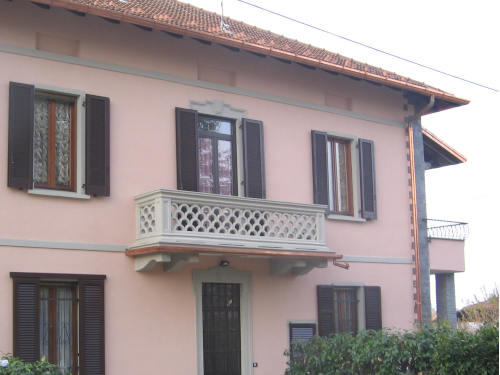 Rasatura con posa rete e finitura con intonachino ai silicati